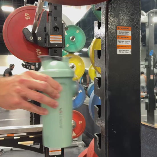 Mag Shaker bottle video showing bottle and phone mounting simultaneously while withstanding weight lifting equipment vibration